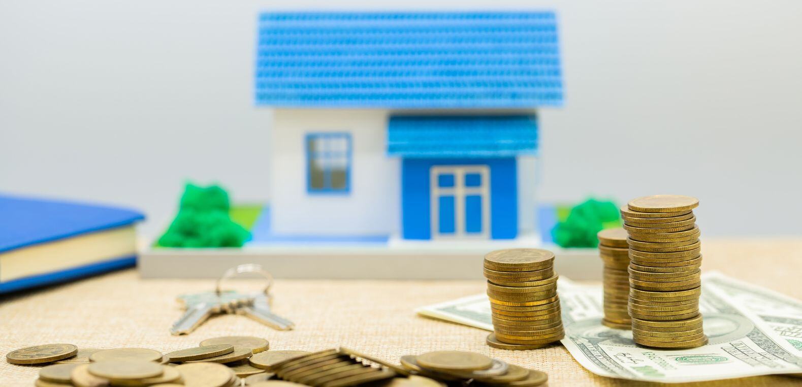 Casa y dinero en alusión a lo que se puede conseguir con el ahorro de la Subcuenta de Vivienda